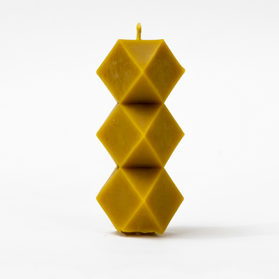 A shaped wax candle, Yellow, L